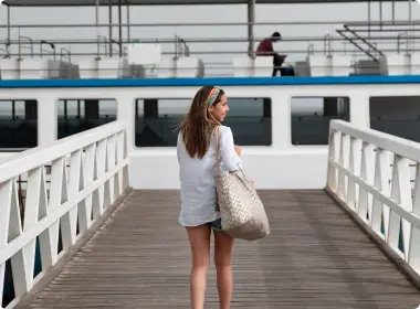 girl walking on a boat